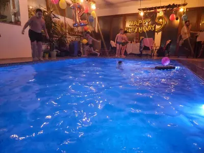 a group of people in a swimming pool at Villa Adanis in Bihać