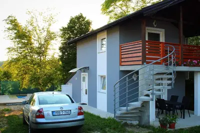 a house with a car parked in front of it at 