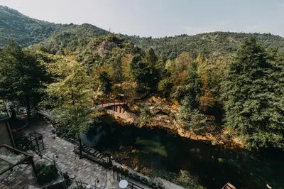 an overhead view of a bridge over a river at Hotel Kostelski Buk in Bihać