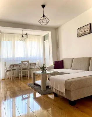 a living room with a couch and a table at Banja Luka 03 in Banja Luka