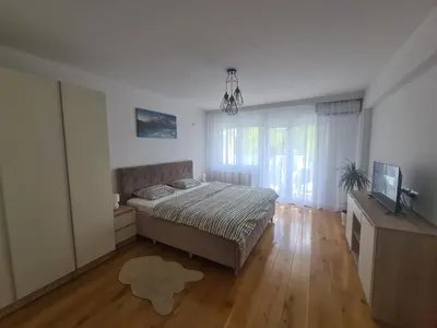 a bedroom with a bed and a television in it at Banja Luka 03 in Banja Luka