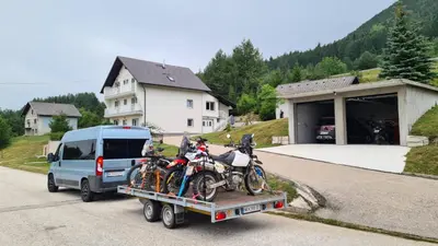 a group of motorcycles on the back of a truck at Apartmani Vila in Kupres