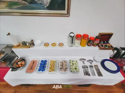 a table with various items on top of it at Garni Motel Aba in Travnik