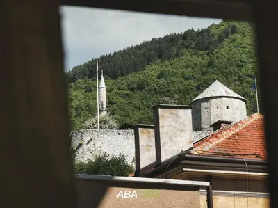 a view from a window of a castle and a tower at Garni Motel Aba in Travnik