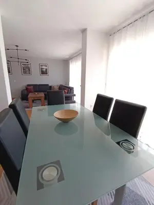 a dining room with a glass table and chairs at DreamHouse in Jajce