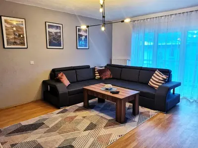 a living room with a couch and a coffee table at DreamHouse in Jajce