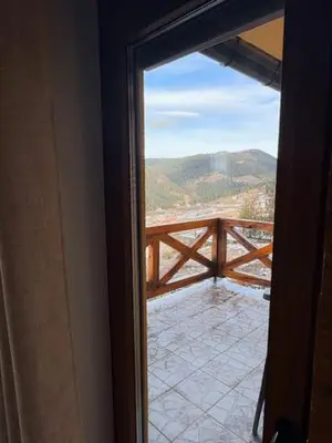 an open door to a balcony with a view at Villa Rustica in Šišava