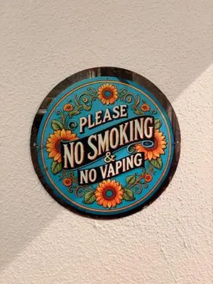 a sign that says please no smoking and no paving at Villa Rustica in Šišava