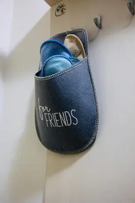 a bag with the words new trends written on it at Apartman Olivia in Banja Luka