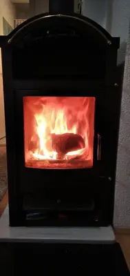 a fireplace with a turkey roast in it at Apartman Luka in Kupres
