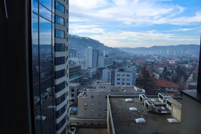 a view of a city from a building at Bright, modern & cozy apartment in Tuzla