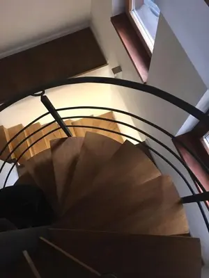 a view of a spiral staircase in a building at KUĆA NENO in Vlasic