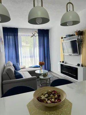 a living room with a couch and a table at Apartment Nostra Aula in Travnik