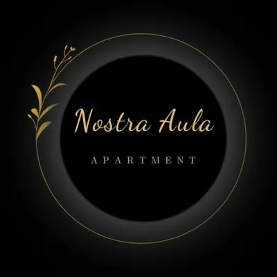 a black and gold plate with the words nostica alpha experiment at Apartment Nostra Aula in Travnik