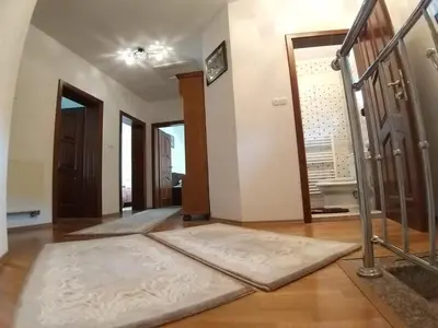 a living room with a large rug on the floor at EMRAH RIVER UNA in Bihać