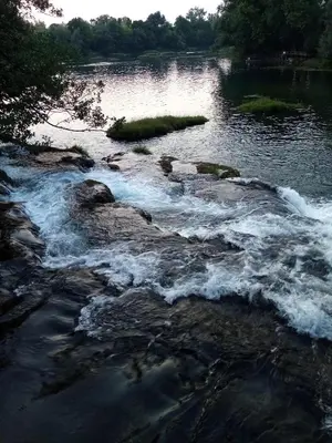 a river with rapids on the rocks at Apartman Dzenis in Bihać