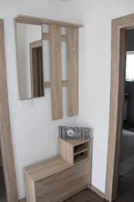 a dressing room with two mirrors and a dresser at Apartman ANA Livno - biker friendly in Livno