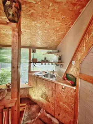 a kitchen with a sink in a tiny house at Pyramid in Visoko