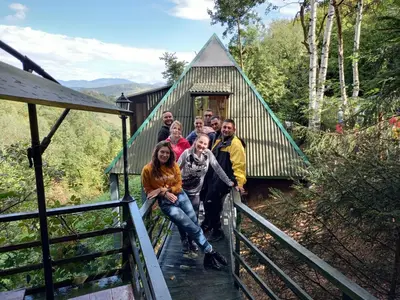a group of people in a tree house at Pyramid in Visoko