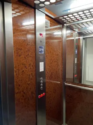 an elevator in a building with a metal door at Apartman CITY CENTER 1-šetalište in Prijedor