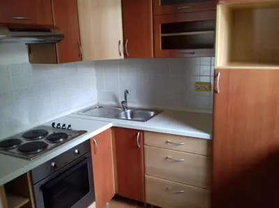 a kitchen with a sink and a stove at Apartment Nice View in Fojnica