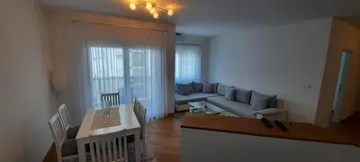 a living room with a couch and a table at CENTAR 2 BANJA LUKA in Banja Luka