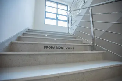 a set of stairs with a sign that reads furoida north at Jelena Apartment II in Doboj