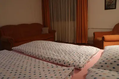 two pillows sitting on top of a bed in a room at Apartman UNA Travnik in Travnik
