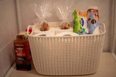 a basket filled with food and snacks on a table at Apartman Ante in Livno
