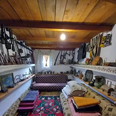 a large room with a couch and chairs in it at Apartman Bosanska Avlija-Muzej- in Visoko