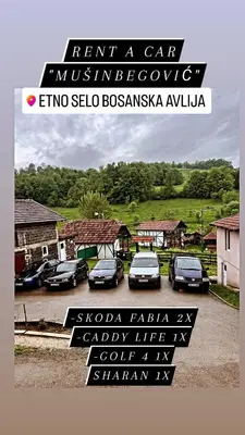 a group of cars parked in a parking lot at Apartman Bosanska Avlija-Muzej- in Visoko