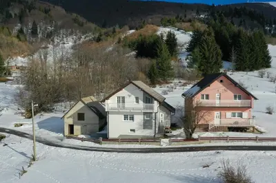 an aerial view of a house in the snow at Kuća za odmor ANA in Kupres