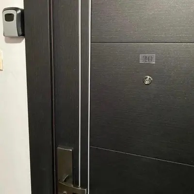 a metal door with the number twenty on it at Dan i noc in Banja Luka