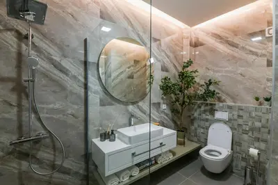 a bathroom with a toilet and a sink and a shower at Hotel City View in Prnjavor