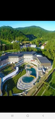 an aerial view of a resort with a swimming pool at APARTMANI PETKOVIC in Teslić