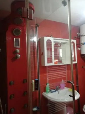 a bathroom with a shower and a sink at Vila Anđelija in Velika Kladuša