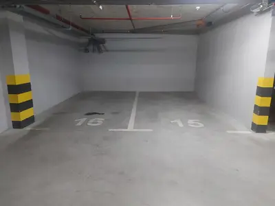 an empty parking lot in a parking garage at Apartman Green Lux in Banja Luka
