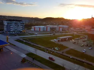 a view of a city with a parking lot at Apartman Istra, Doboj in Doboj