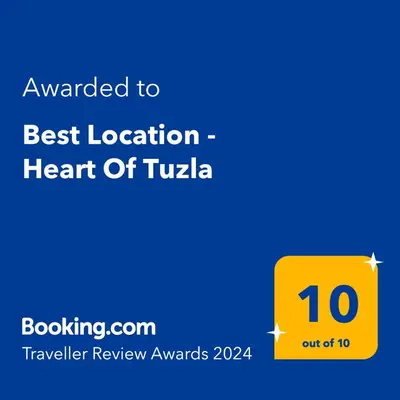 a yellow sign that says best location heart of tula at Best Location - Heart Of Tuzla in Tuzla