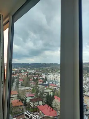 a view of a city from a window at Best Location - Heart Of Tuzla in Tuzla