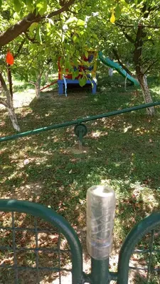 a park with a playground with a play park at Medena oaza mira in Visoko