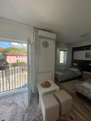 a living room with a view of a bedroom at Motel Liberta in Jajce