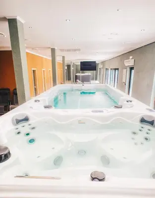 a jacuzzi tub in a hotel room at Ribarski konaci in Doboj
