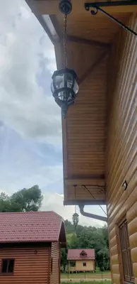 a light hanging from the ceiling of a barn at Vikendica na Janju in Šipovo