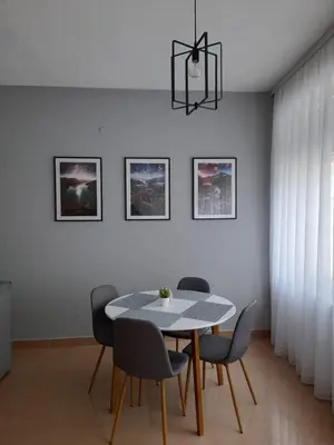 a dining room with a table and chairs at King's Cave in Jajce