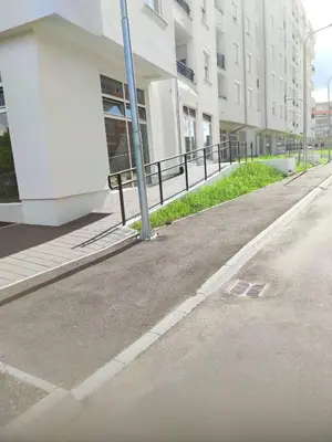 an empty street in front of a building at Loft Lux in Banja Luka