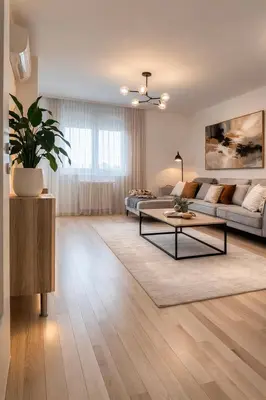 a living room with a couch and a table at Loft Lux in Banja Luka