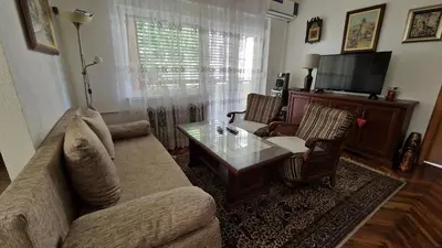 a living room with a couch and a coffee table at TUZLA ViVa 2 in Tuzla