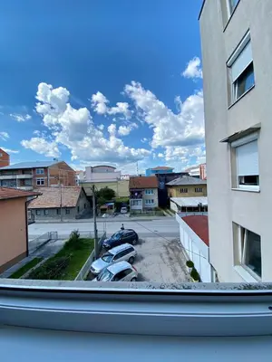 a view from a window of cars parked in a parking lot at Apartment Lamele Bugojno in Bugojno