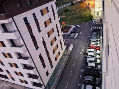an aerial view of a parking lot in a parking garage at Apartman Mirabell, Doboj in Doboj